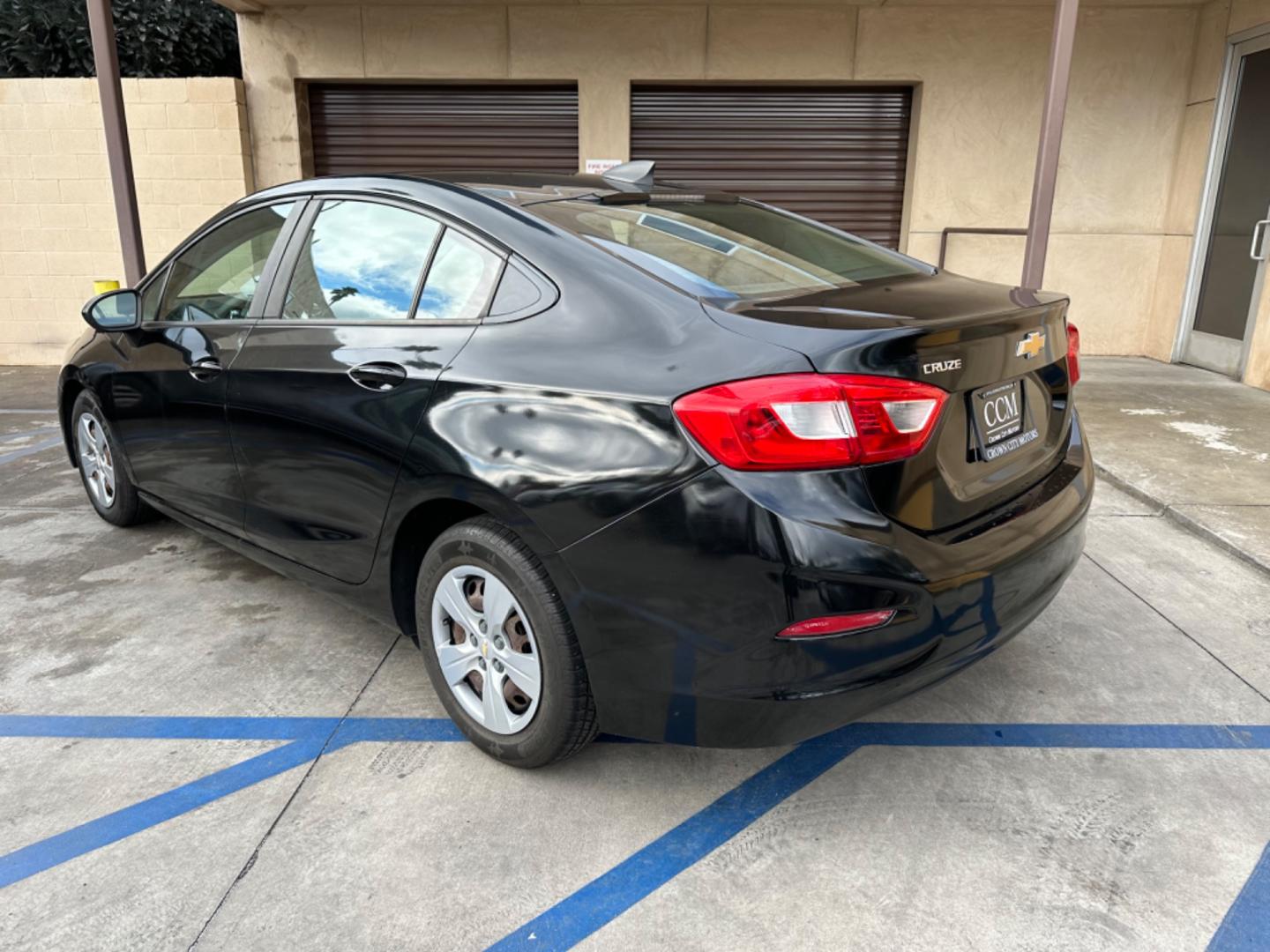 2017 Black /BLACK Chevrolet Cruze LS Auto (1G1BC5SM6H7) with an 1.4L L4 DOHC 16V TURBO engine, 6A transmission, located at 30 S. Berkeley Avenue, Pasadena, CA, 91107, (626) 248-7567, 34.145447, -118.109398 - Crown City Motors is a used “Buy Here Pay Here” car dealer in Pasadena CA. “Buy Here Pay Here” financing, means that when you purchase your vehicle from our dealership, that you make the payments to the dealership as well. We do not need the banks approval to get you approved for a used auto - Photo#2